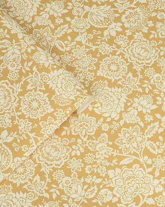 Trailing Laurissa Pale Ochre Yellow Wallpaper view of wallpaper and roll of wallpaper