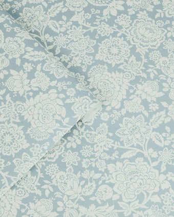 Trailing Laurissa Pale Seaspray Blue Wallpaper view of wallpaper and roll of wallpaper