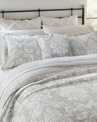 Venetia Grey Reversible Quilt Bonus Set close up view of quilt, 2 shams and 1 pillow cover