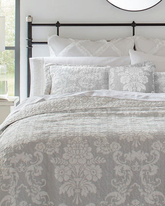 Venetia Grey Reversible Quilt Bonus Set close up view of quilt, 2 shams and 1 pillow cover