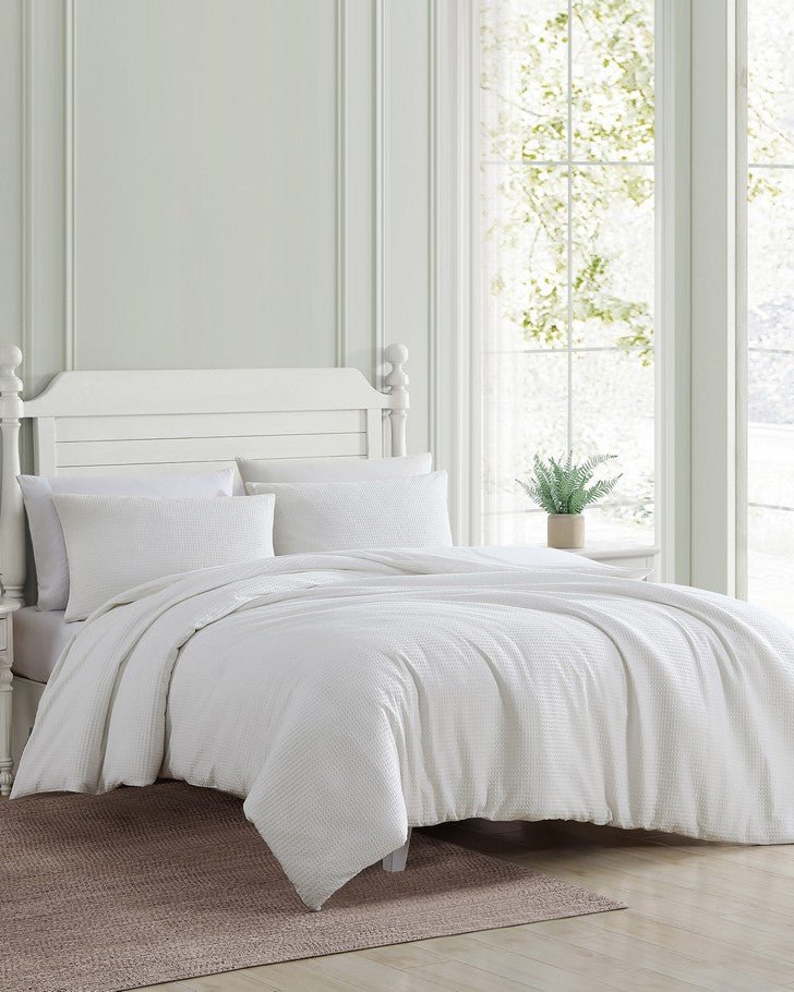 Waffle Pique White Comforter Set View of comforter set on a bed.