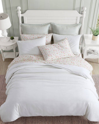 Waffle Pique White Duvet Cover Set Over head view of duvet and shams on a bed
