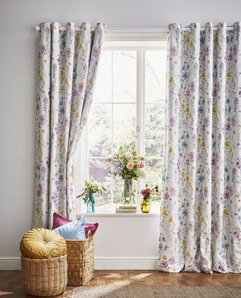 Wild Meadow Multi Blackout Ready Made Curtains - View of curtains hanging 